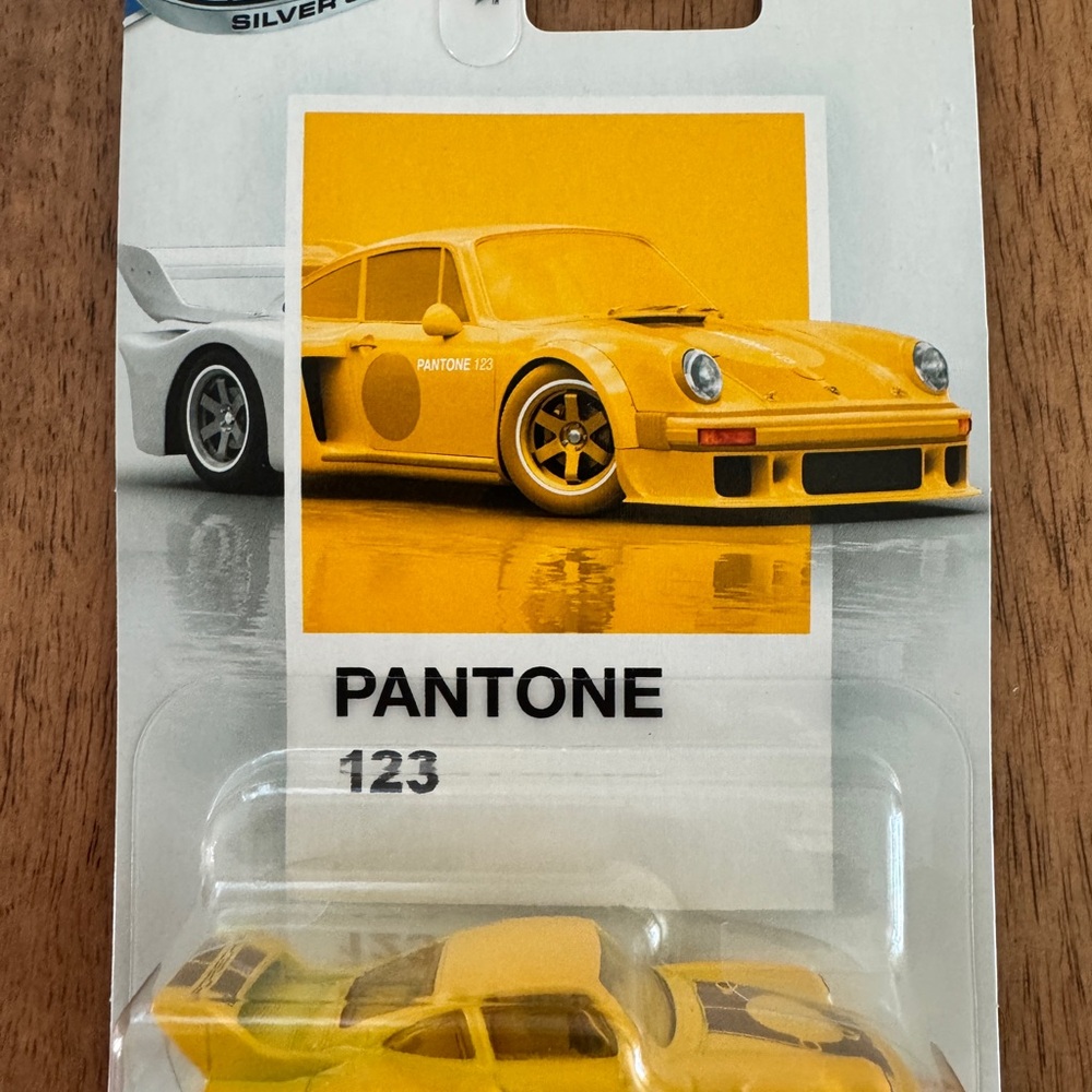 Mattel Yellow Pantone 123 Porsche-style Die-Cast Car